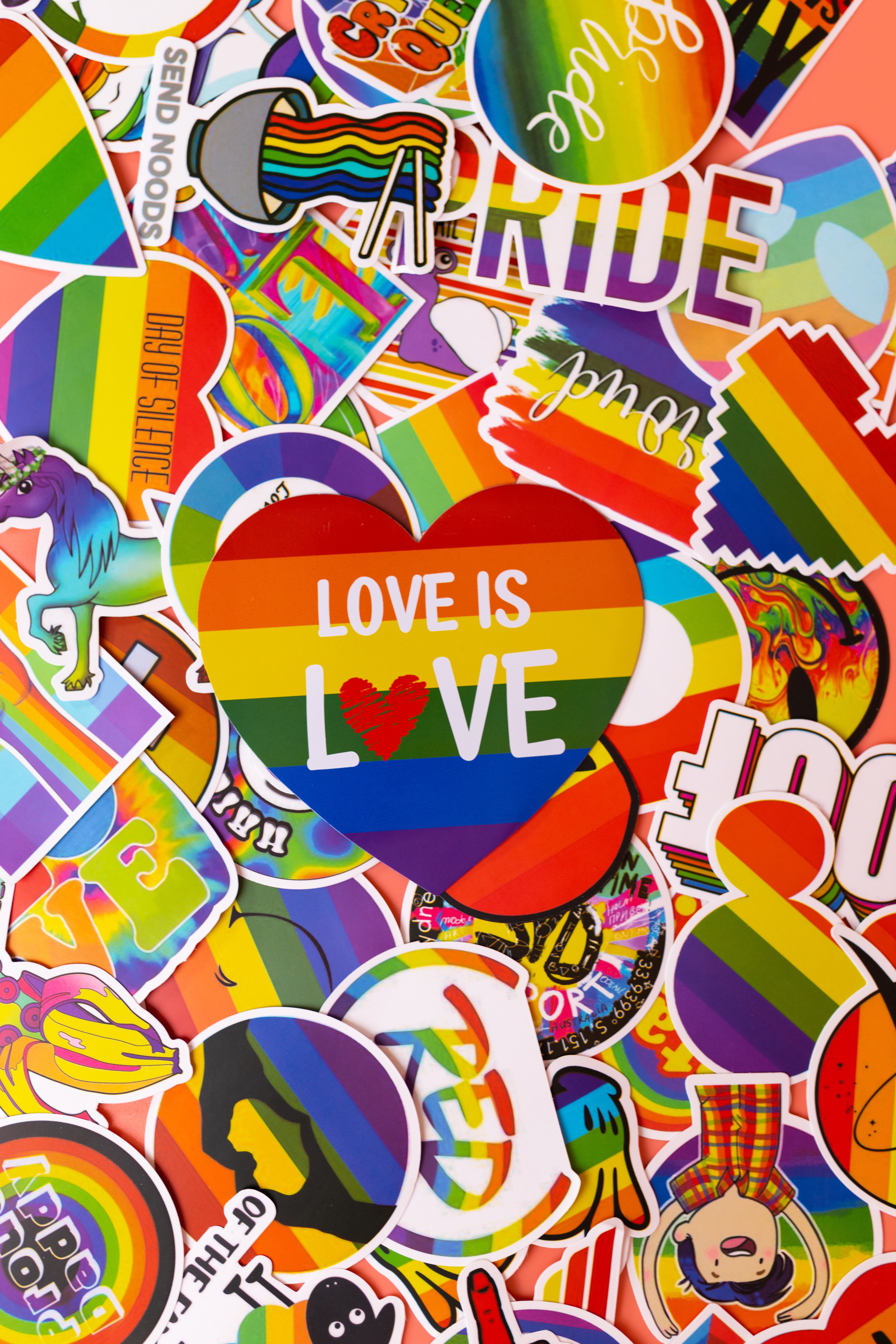 LGBT Emblems Pins and Labels with Slogans of Love and Pride · Free