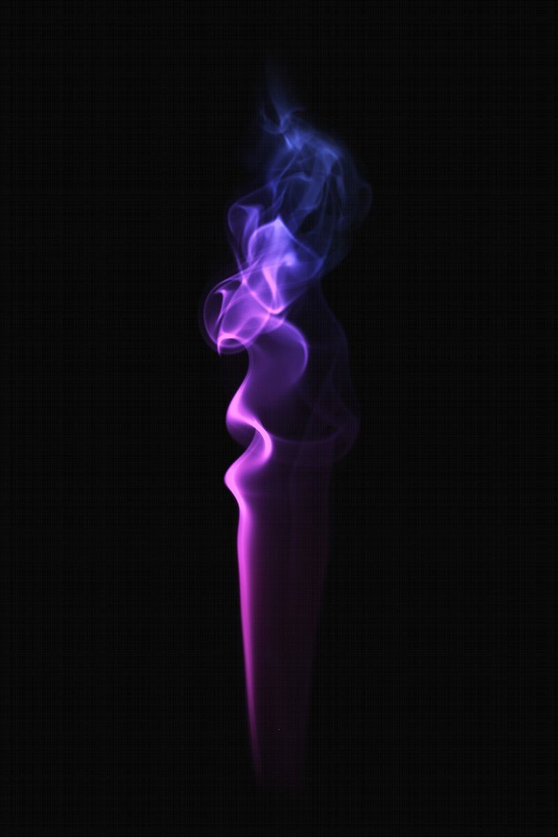 A purple and blue colored smoke against a black background - Smoke