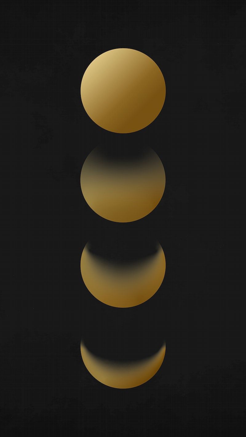 A black background with a gold gradient - Moon phases
