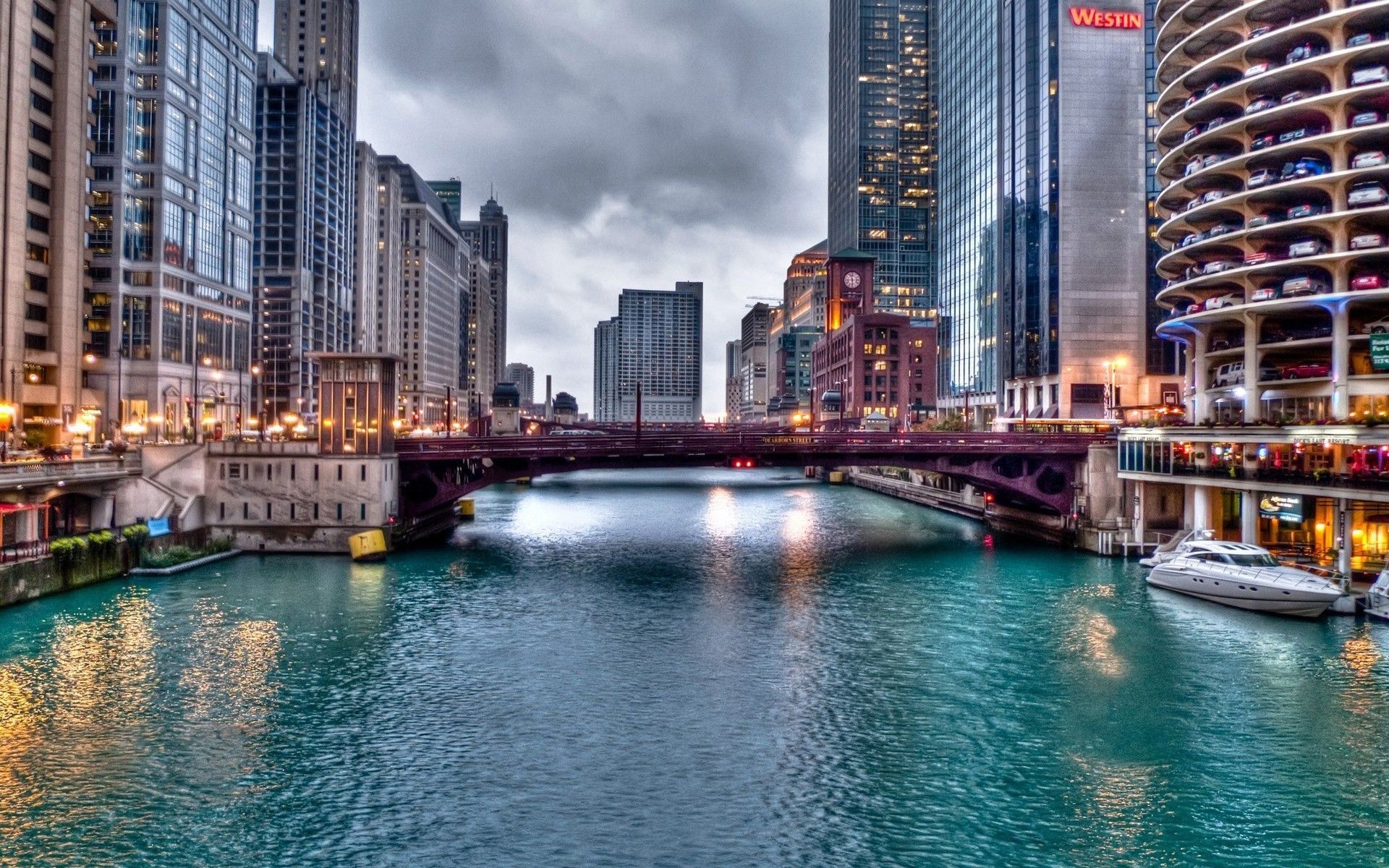 A river with boats and buildings on it - Chicago