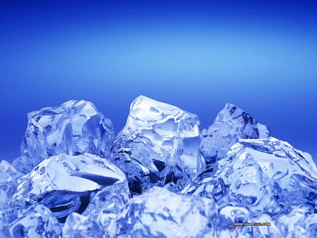 A close up of some ice cubes on blue background - Ice