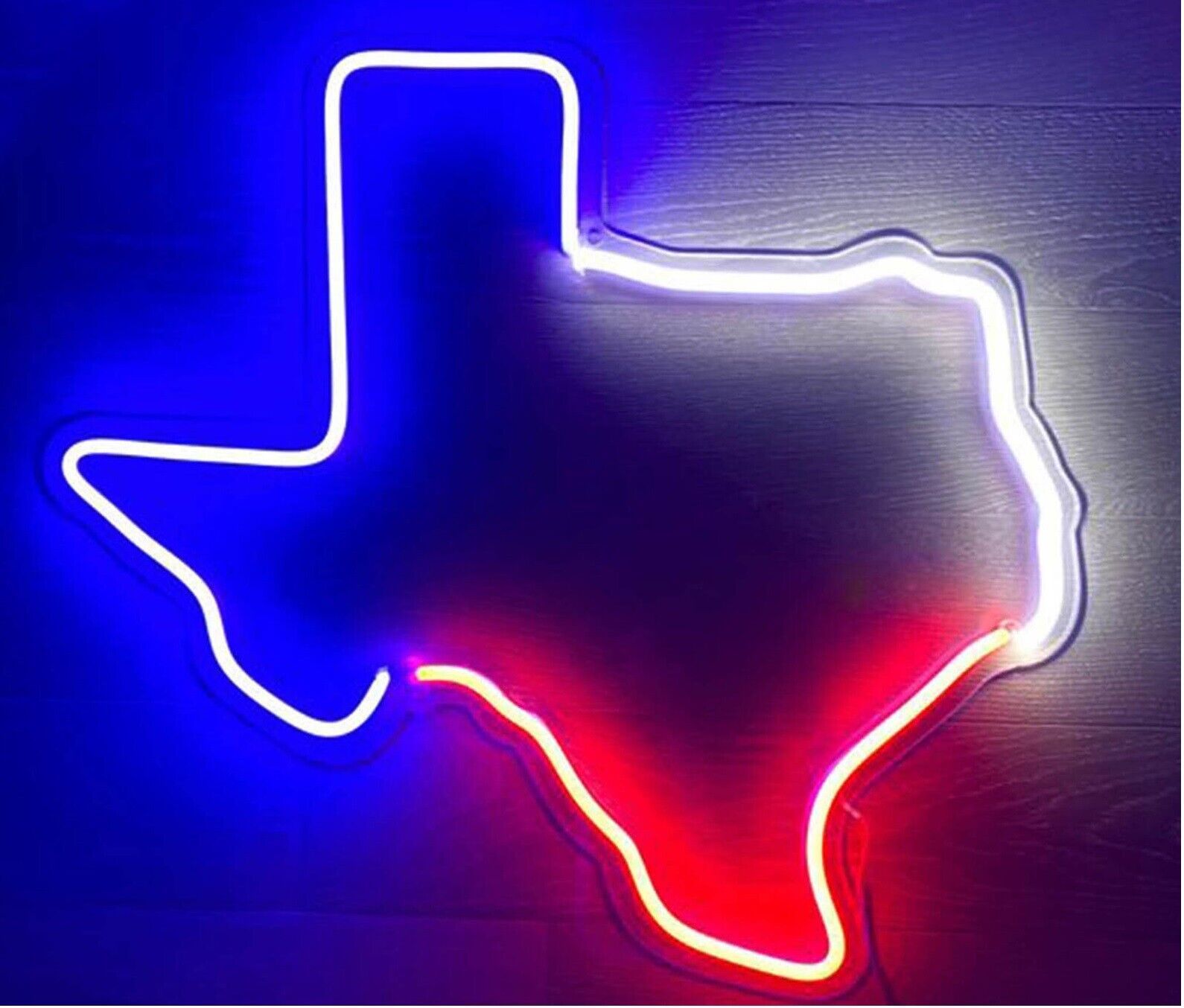 A neon sign of the state texas - Texas