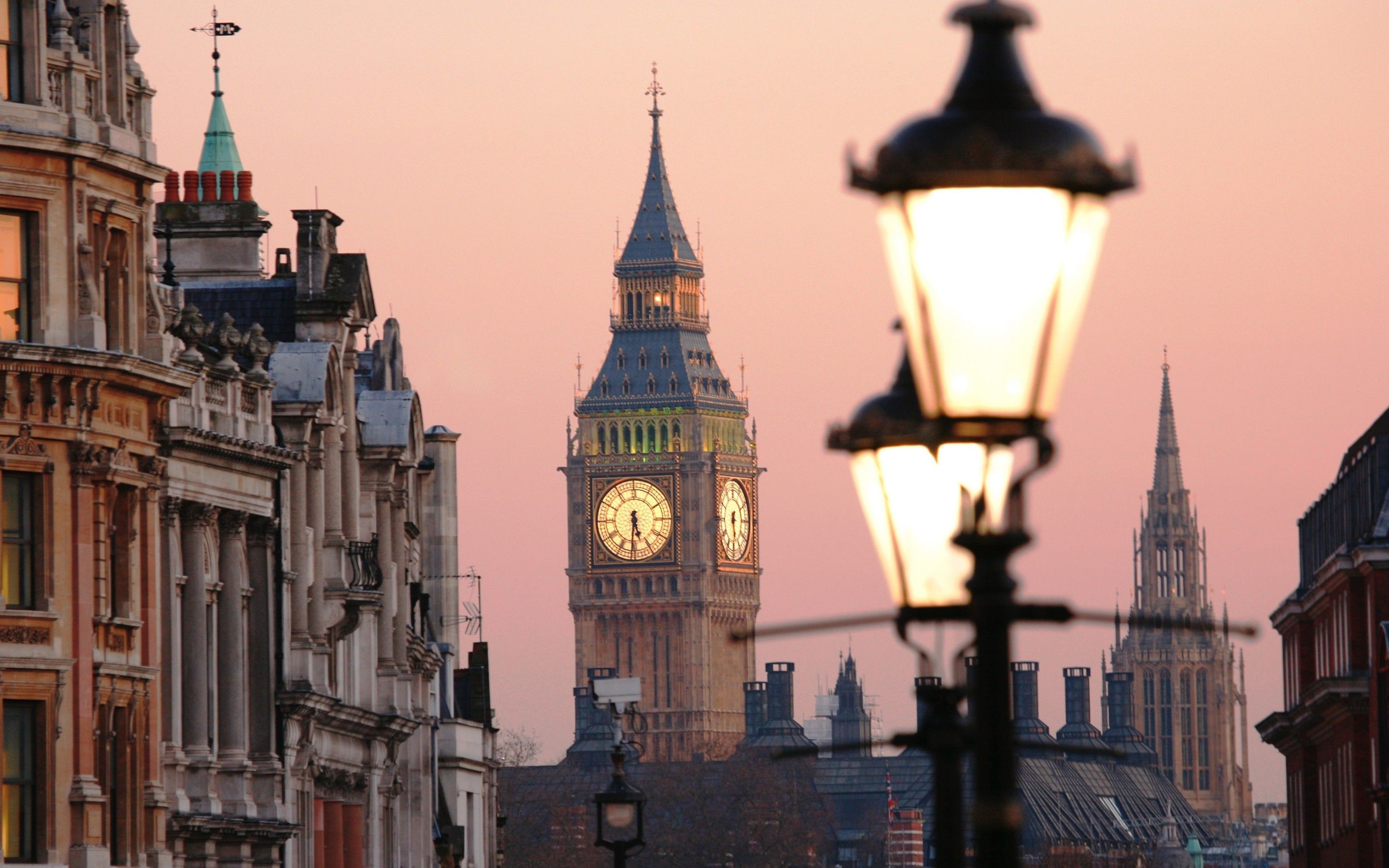 A street lamp with a clock tower in the background. - London