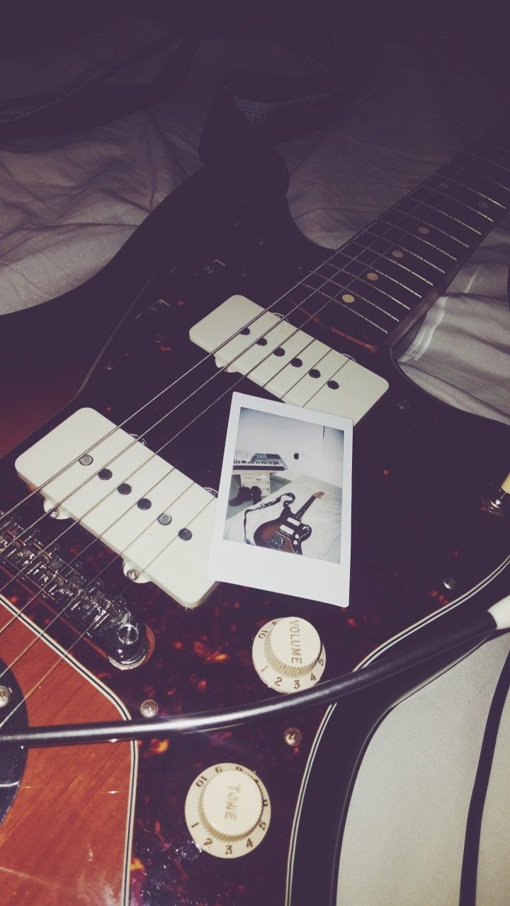 A guitar with an instagram picture on it - Guitar