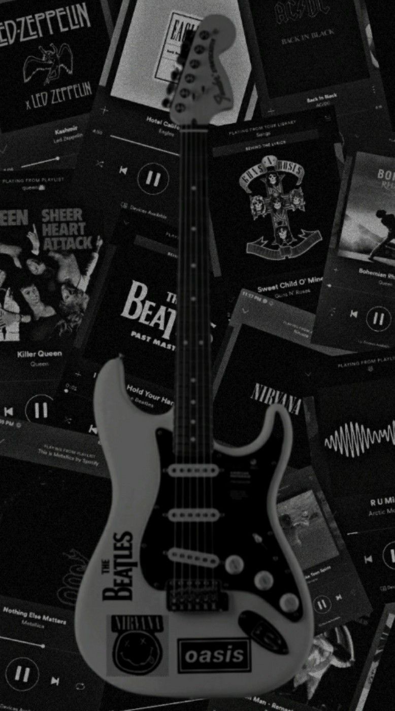 Black and white guitar wallpaper with many different bands and songs in the background. - Guitar