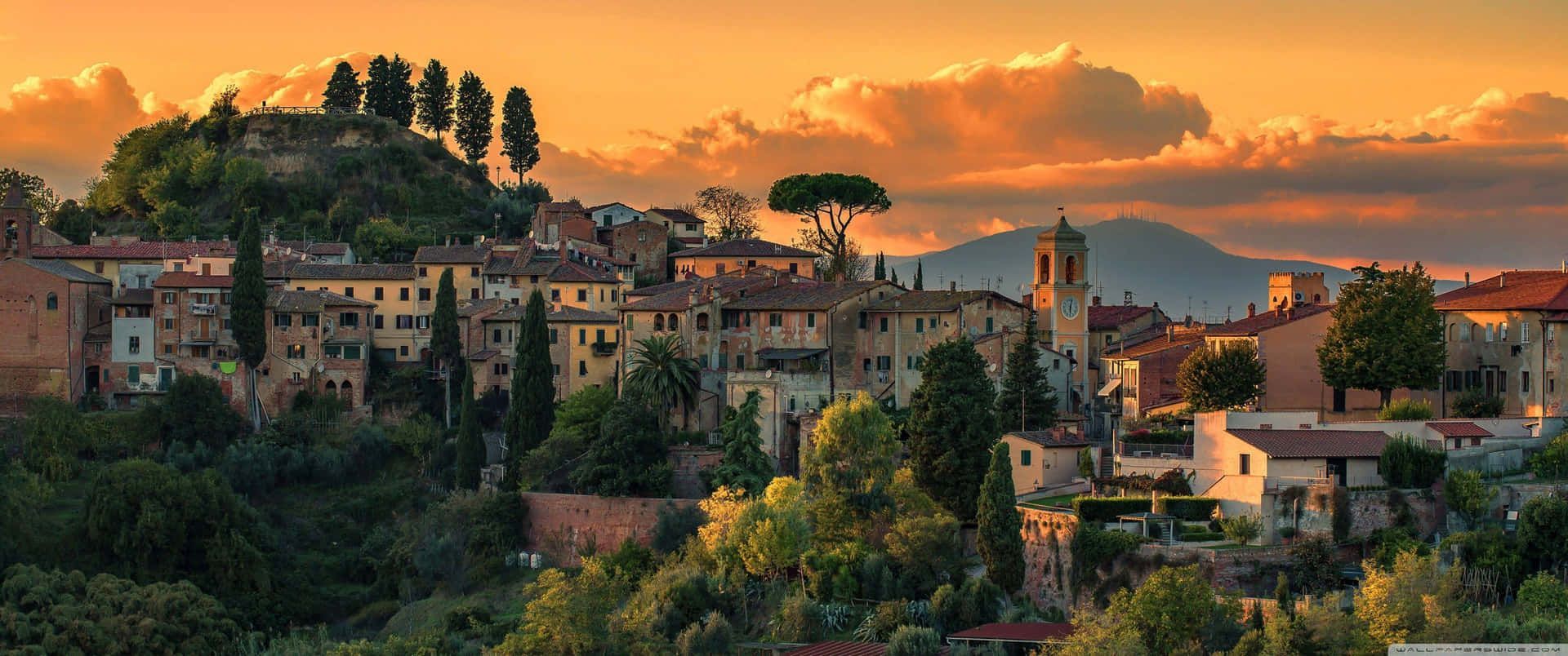 The city of Montepulciano in Italy, nestled in the hills. - Italy