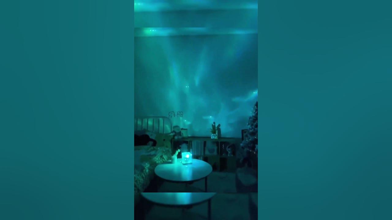 The Aurora Borealis is a natural light display in the Earth's sky, caused by the reflection of light from the sun through electrically charged particles from the sun, known as the solar wind, off the Earth's atmosphere. - Cyan