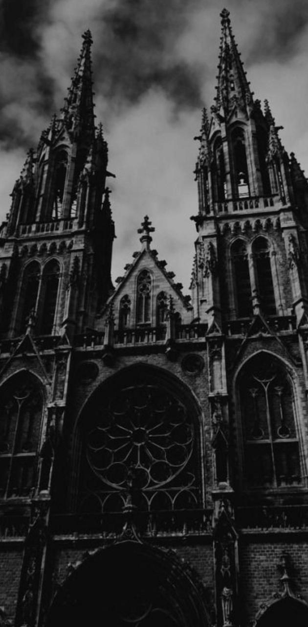 A black and white photo of a gothic cathedral with two tall towers. - Castle