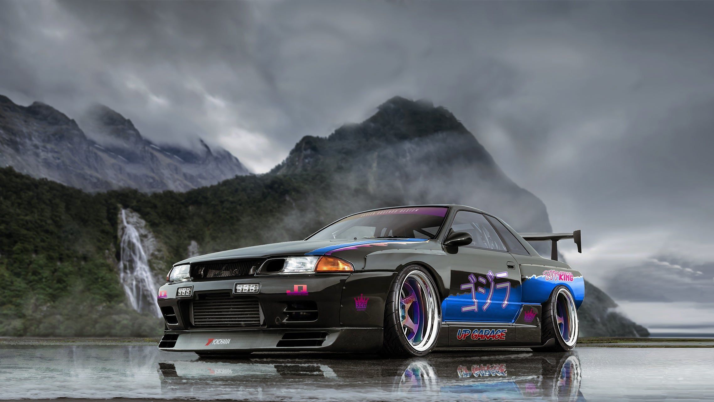 A car is parked in front of mountains - JDM