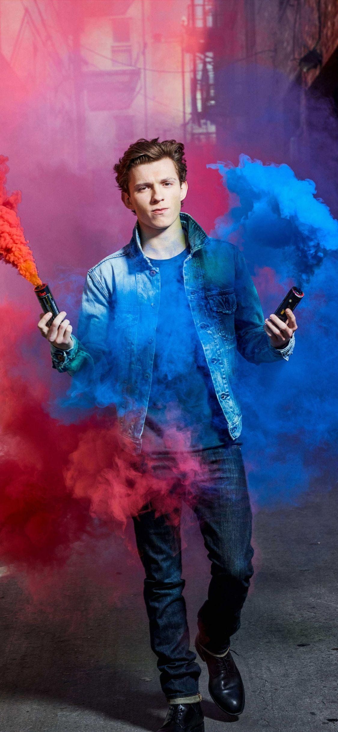 Tom Holland with blue smoke Wallpaper Download