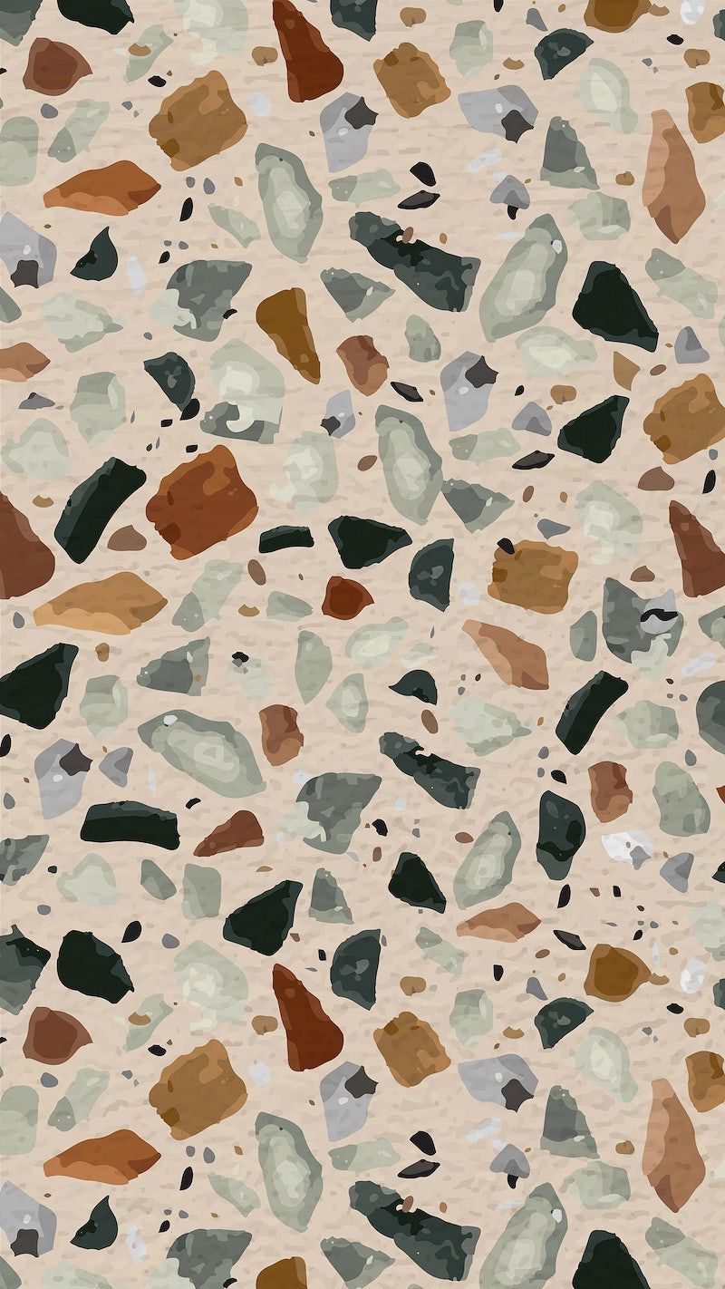 A pattern of different colored rocks on a tan background - Terrazzo