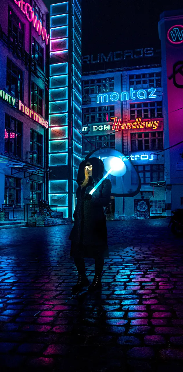 A hooded figure holding a glowing baton in a neon-lit city. - Cyberpunk 2077