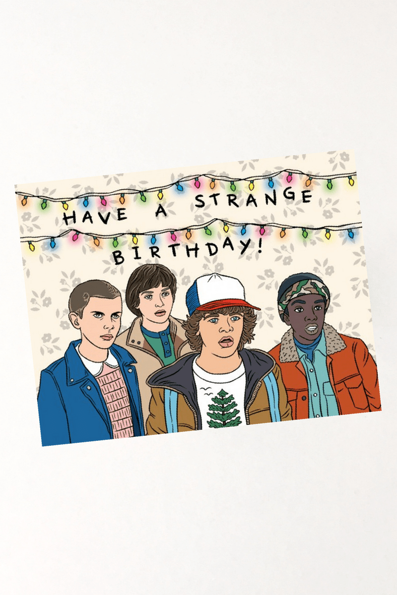 A birthday card with the Stranger Things characters on it. - Stranger Things