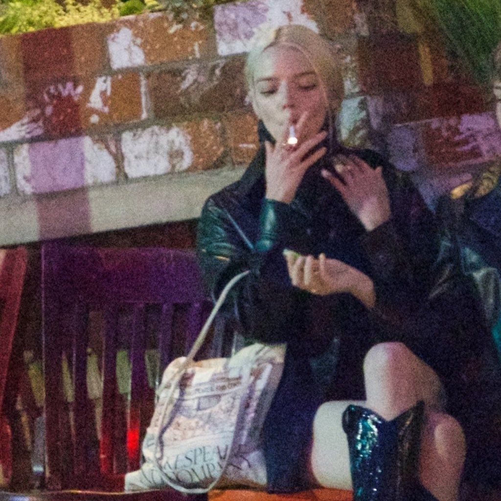 <ref> Anya Taylor Joy</ref><box>(385,45),(993,997)</box> is seen smoking a cigarette while on a night out with friends in London - Anya Taylor-Joy