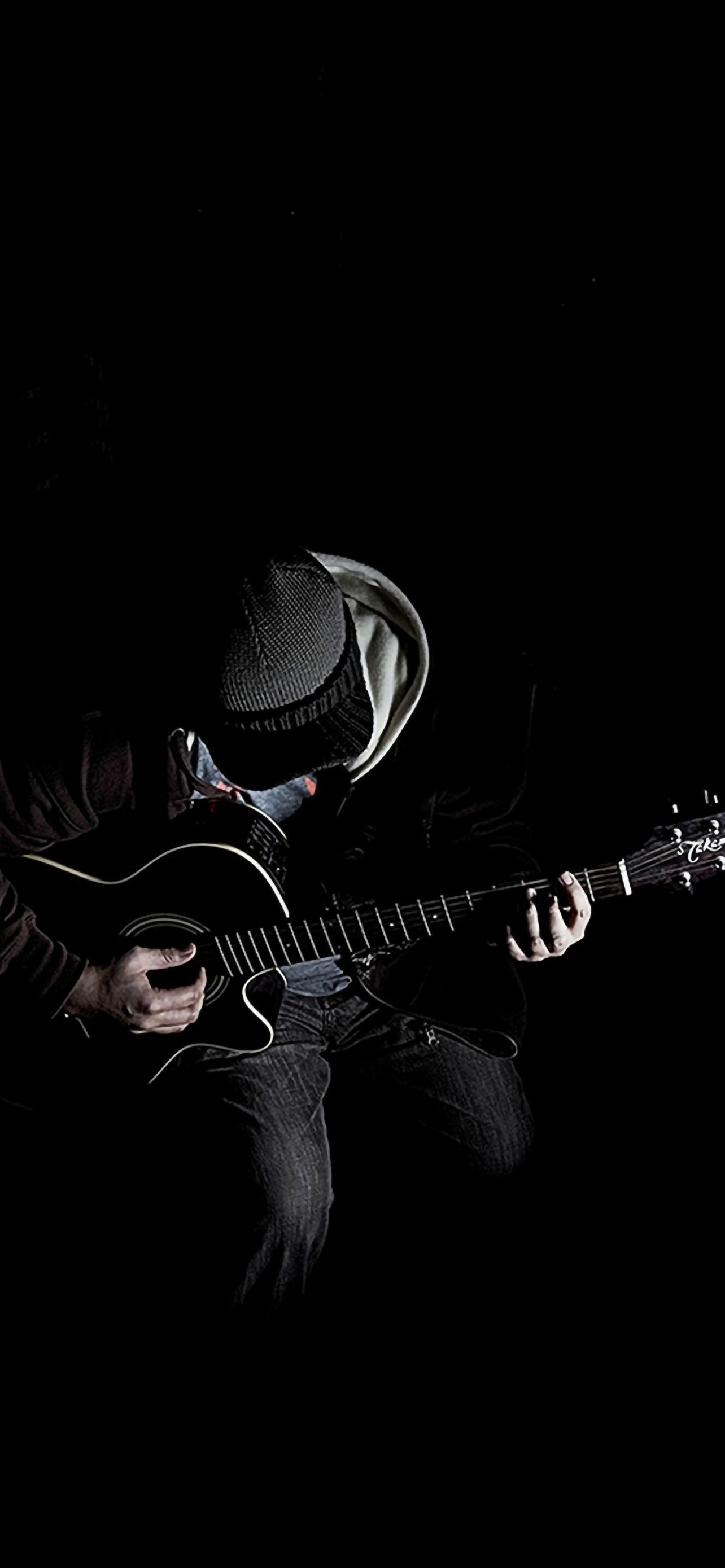 A man playing guitar in the dark - Music, dark, guitar