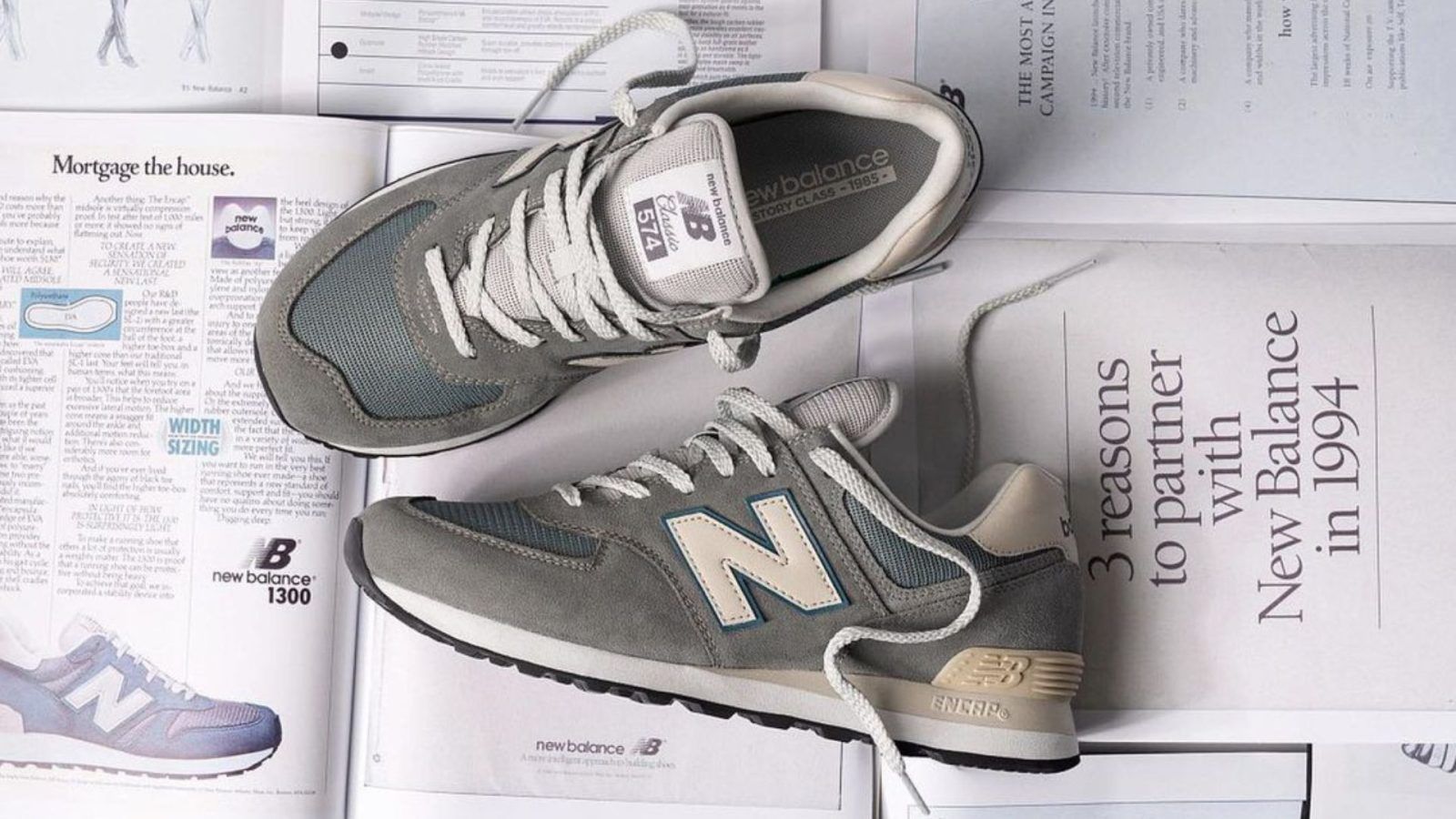 A pair of New Balance sneakers in grey and blue. - New Balance