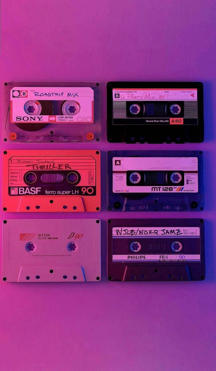 A group of cassette tapes on display - Music, Spotify