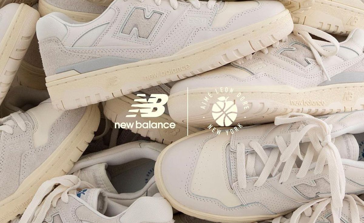 A pile of white New Balance sneakers - New Balance