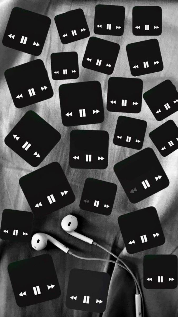 A bunch of black squares with headphones on them - Music