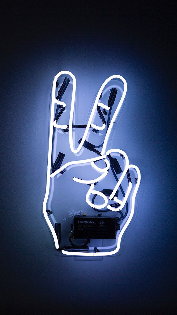 A neon sign that is shaped like the peace symbol - Neon, neon blue