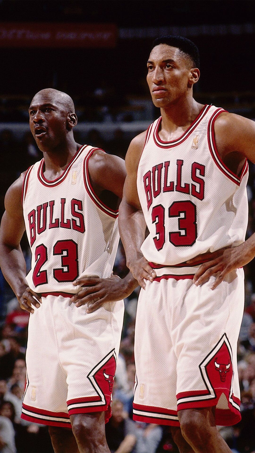 Scottie Pippen and Michael Jordan of the Chicago Bulls look on during a game in 1997. - Michael Jordan