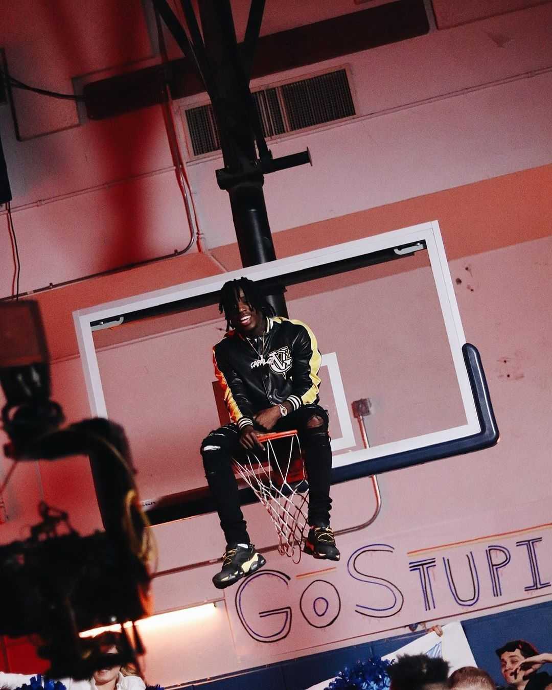 Young Dolph sitting on top of a basketball hoop - Music