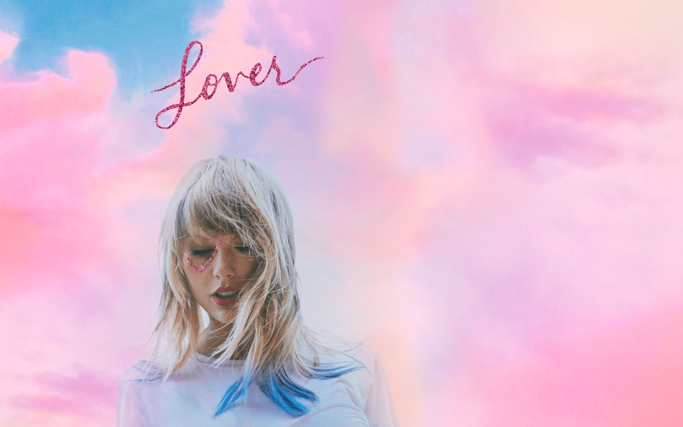 Taylor Swift Lover album cover with pink and blue clouds in the background. - Taylor Swift