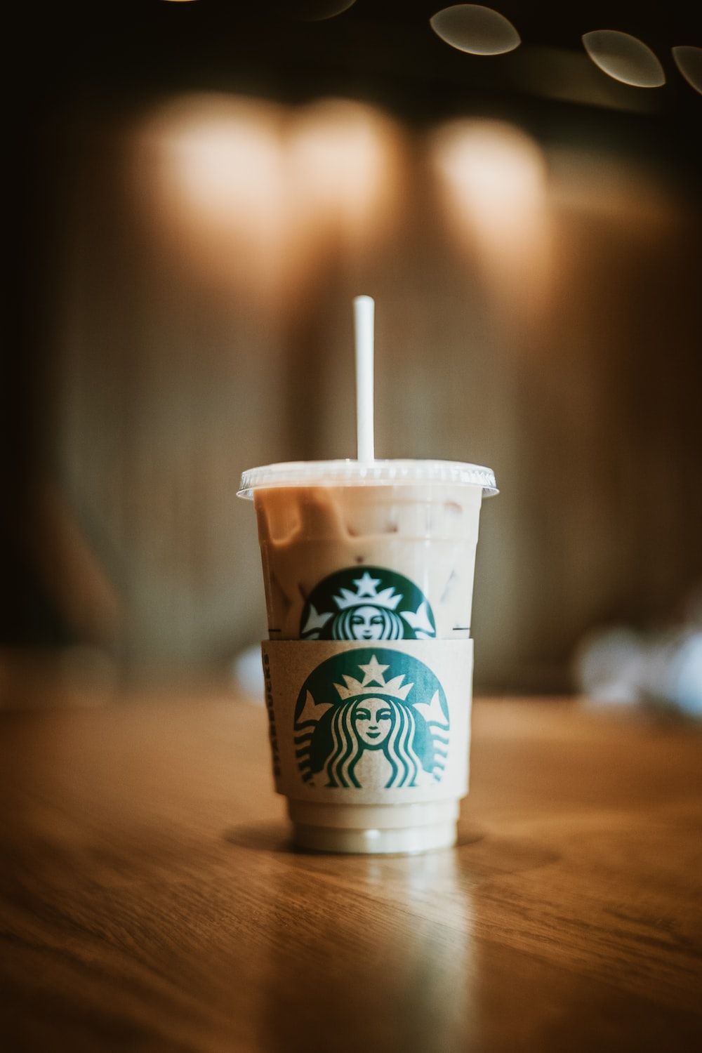 White and brown starbucks disposable cup photo