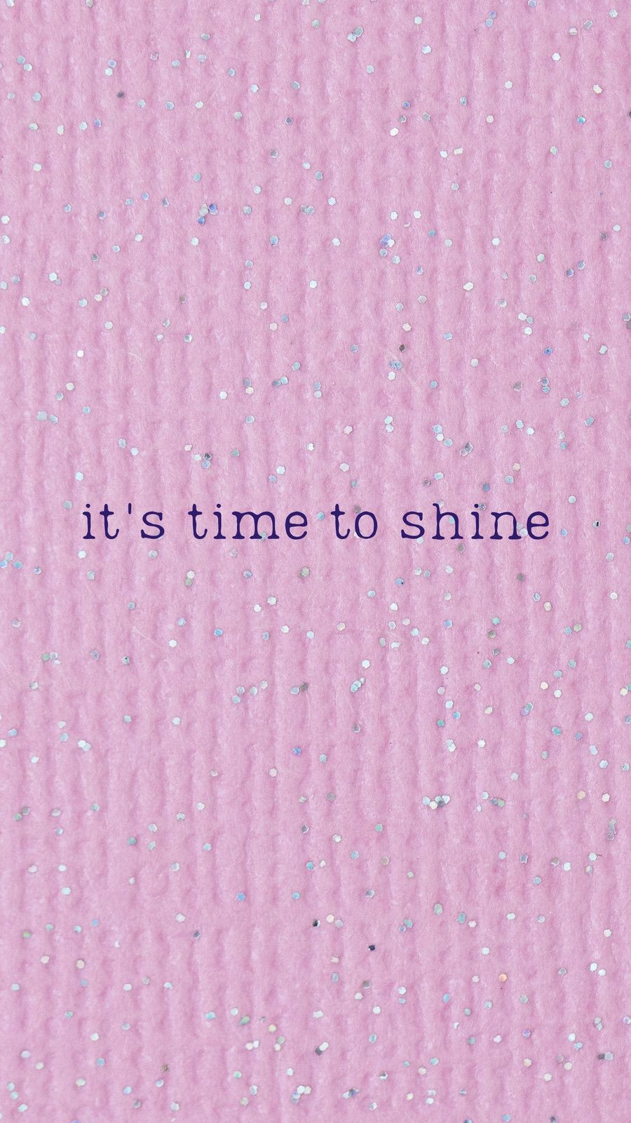 A pink background with white and blue glitter and the words 