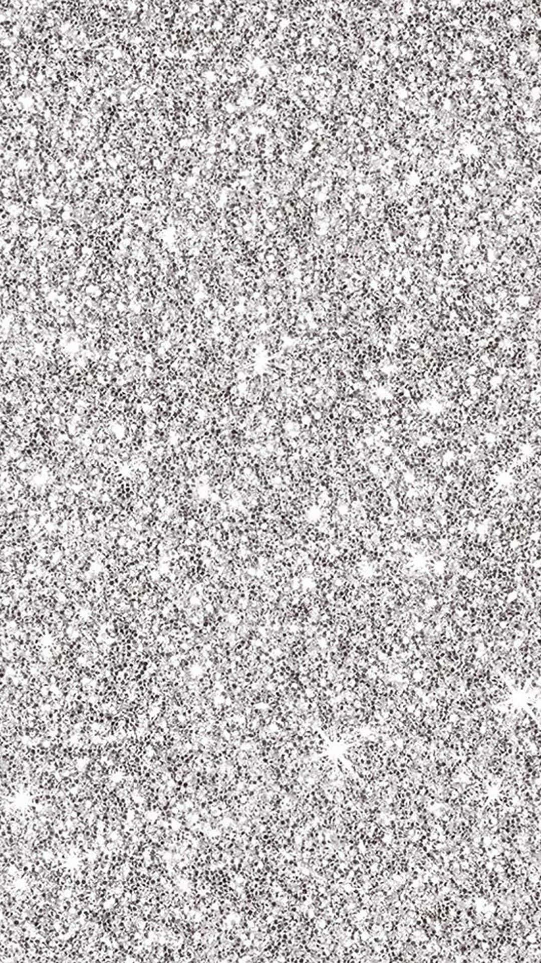 A silver glitter background with a sparkly texture - Silver