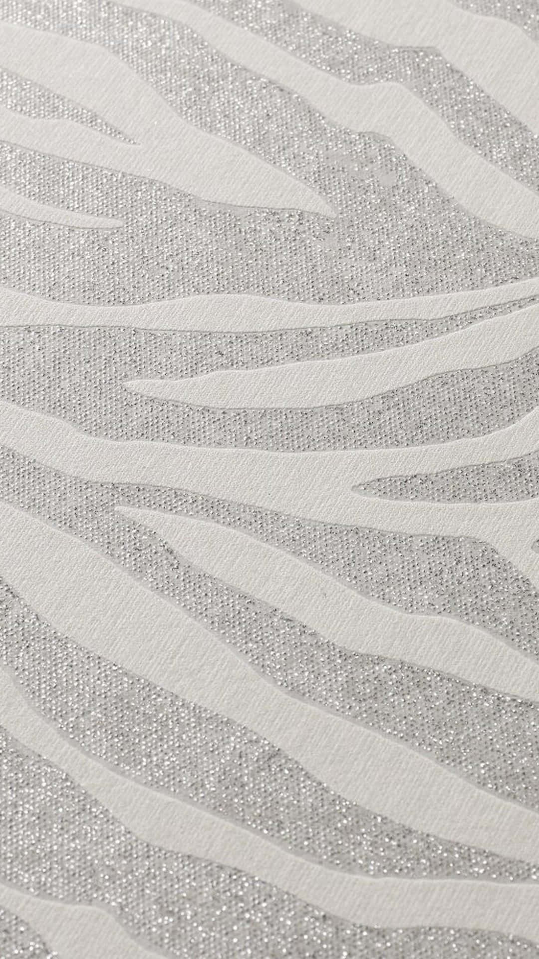 A close up of the metallic wave pattern on the wallpaper. - Silver