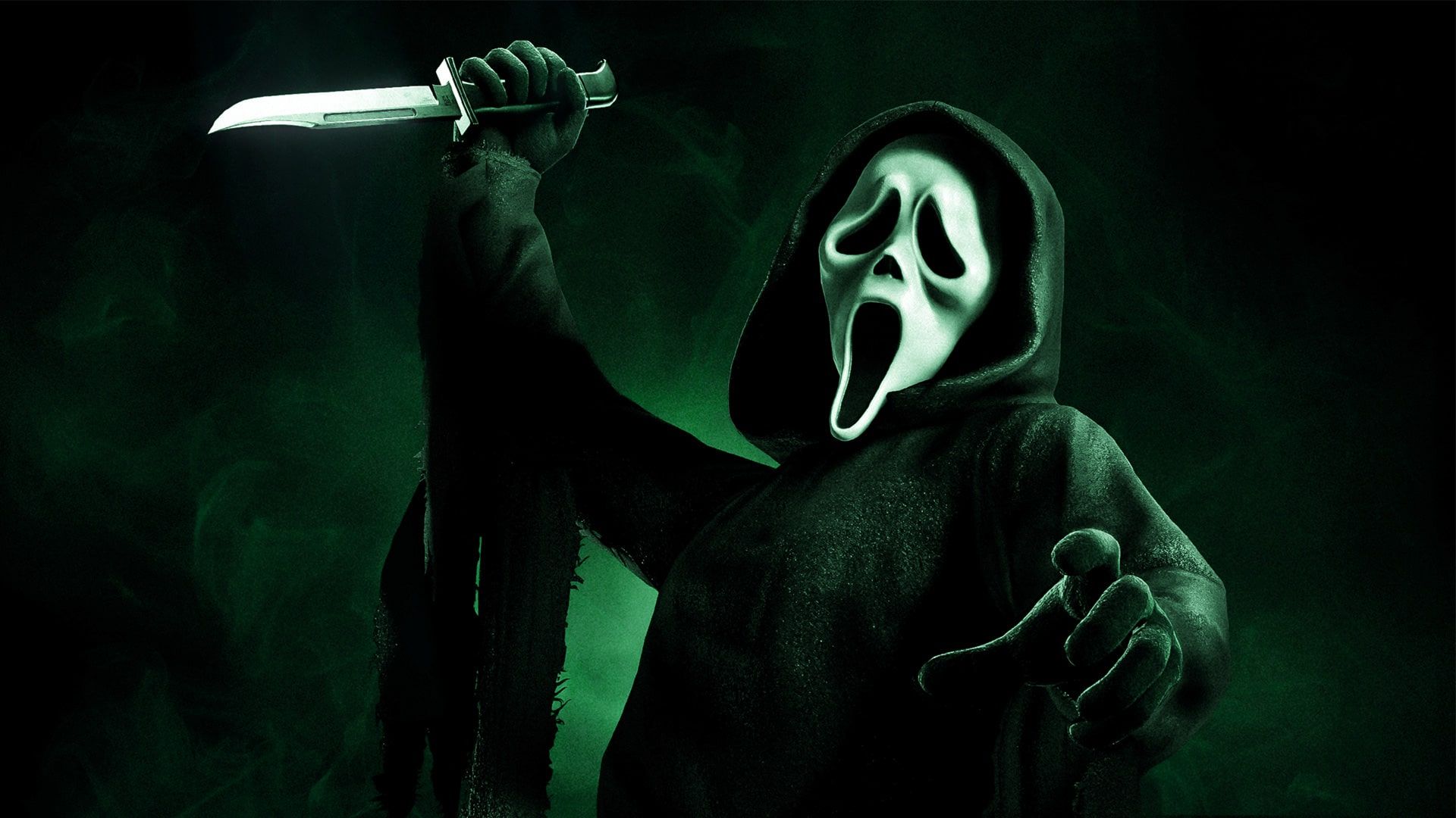 A man wearing a white ghostface mask and a black hooded sweatshirt with a knife in his hand - Ghostface