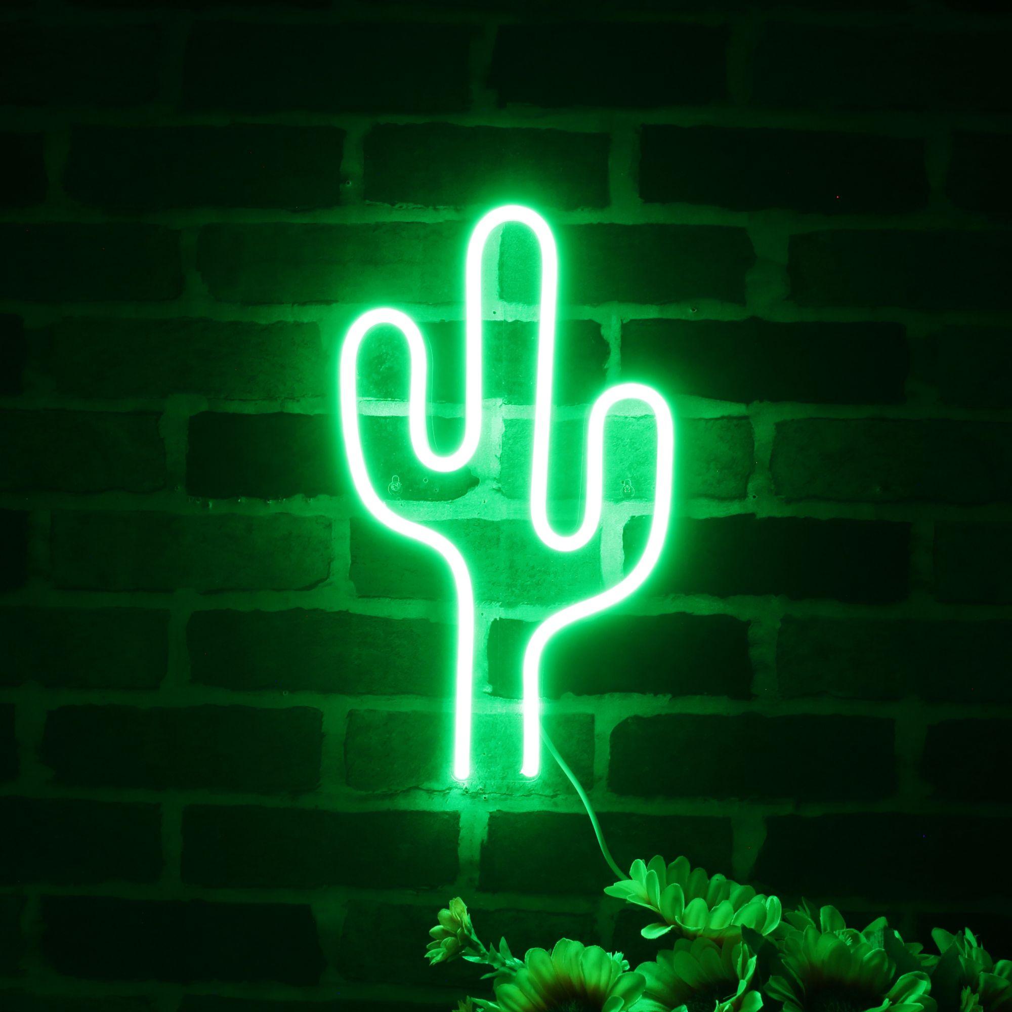 A neon sign of a cactus in green. - Lime green