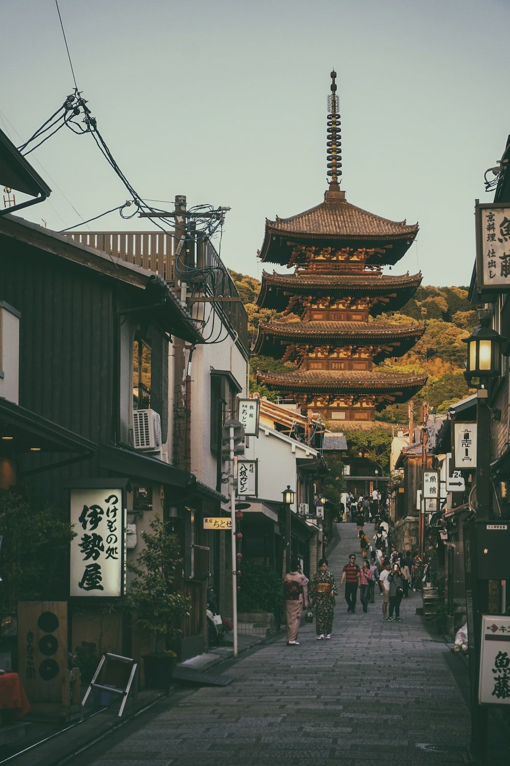 A street in Kyoto, Japan with a pagoda in the background - Japanese