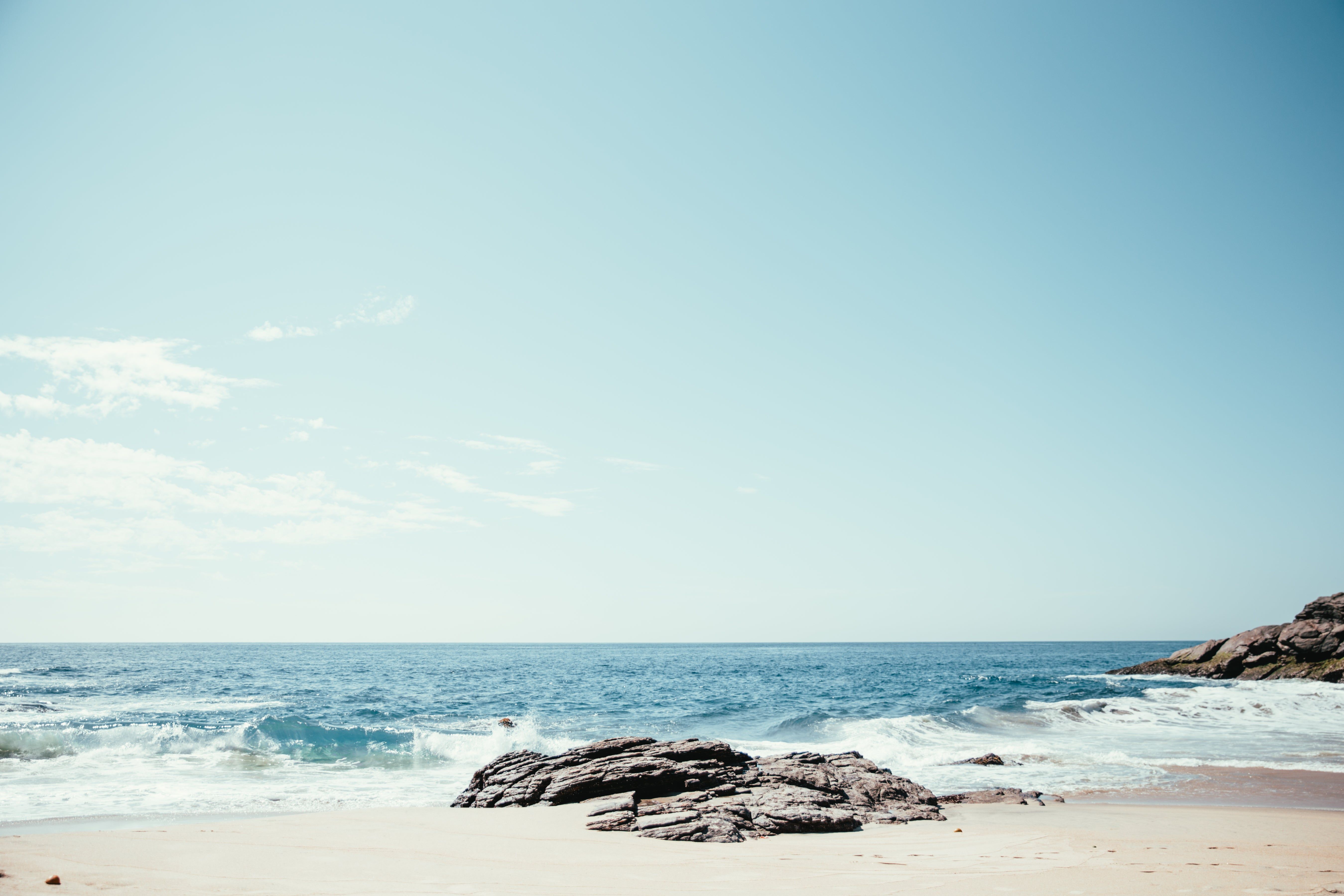 Free of Waves Crash On Rocks And Sand