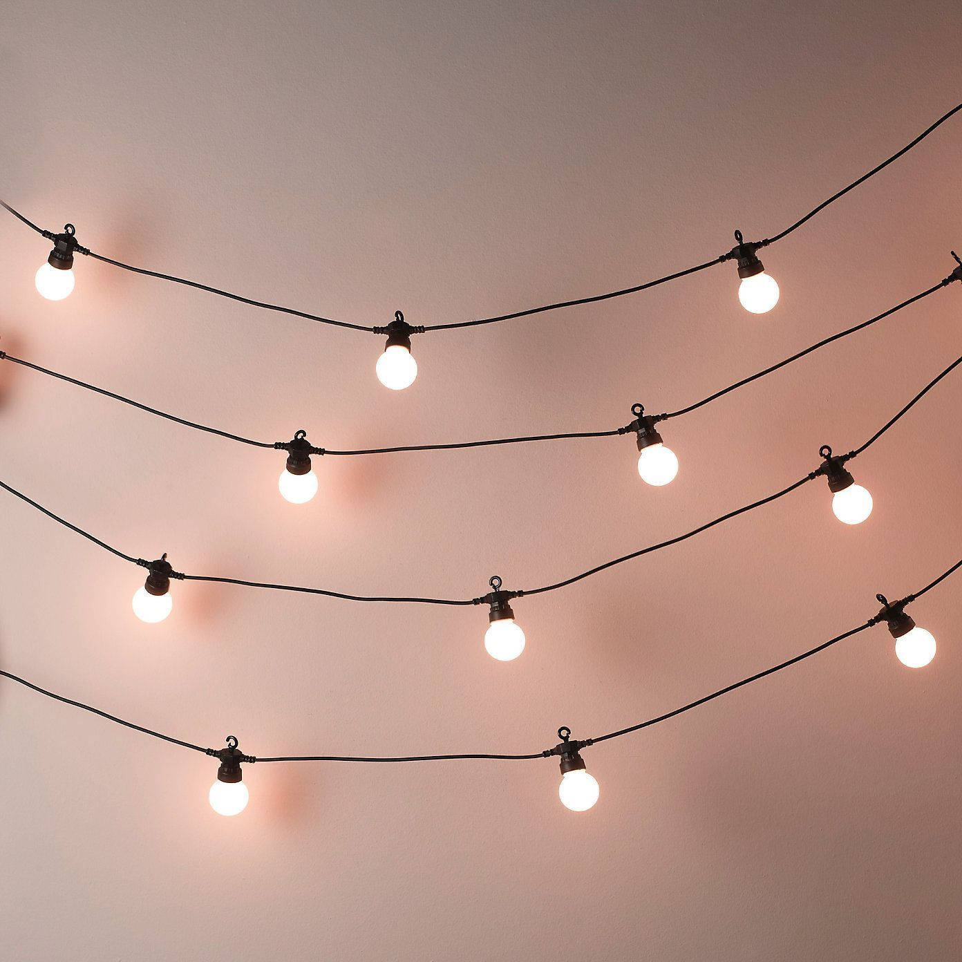 Download Aesthetic Fairy Lights In White Wall Wallpaper