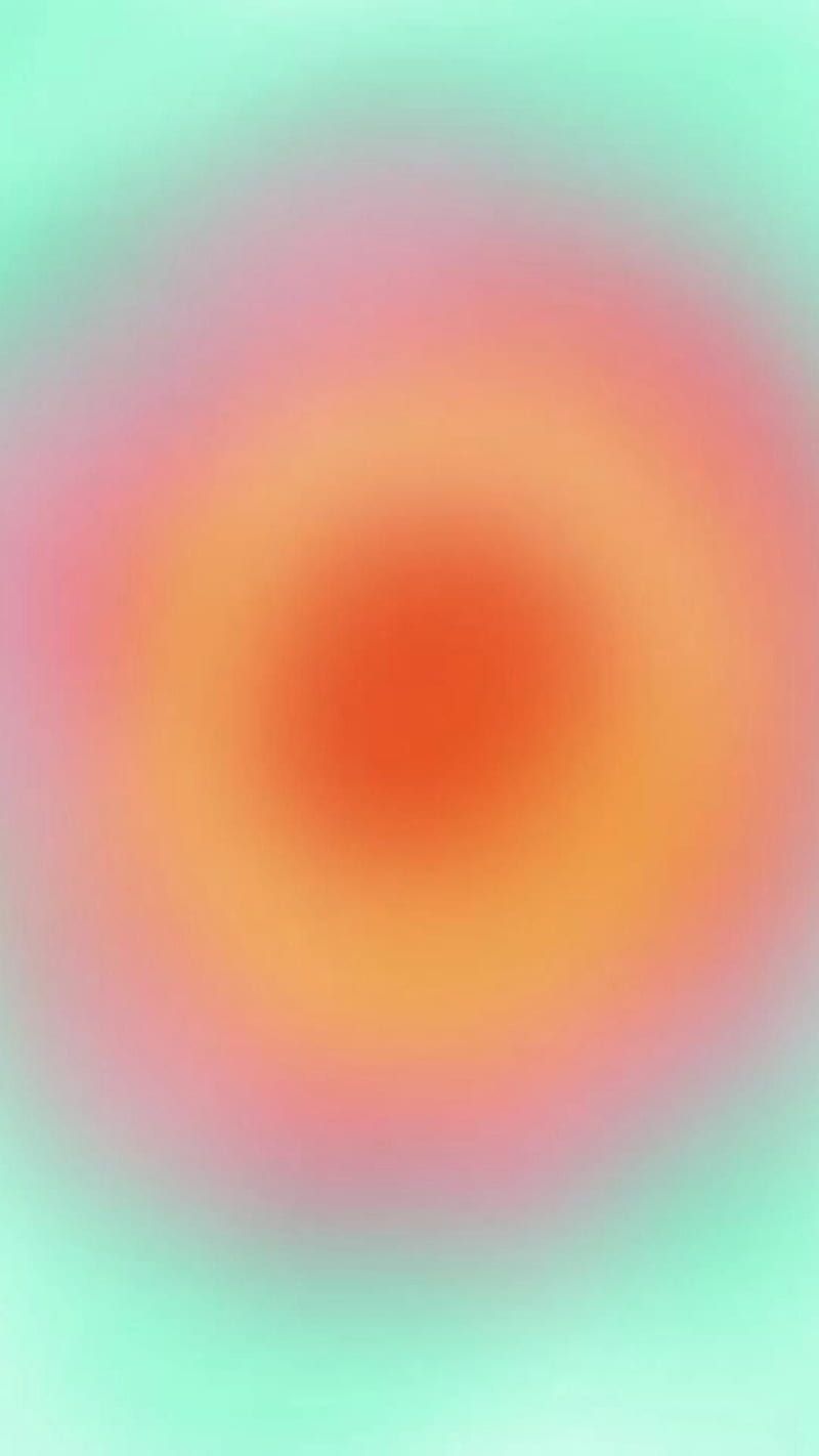 A circle of orange and pink colors - Aura