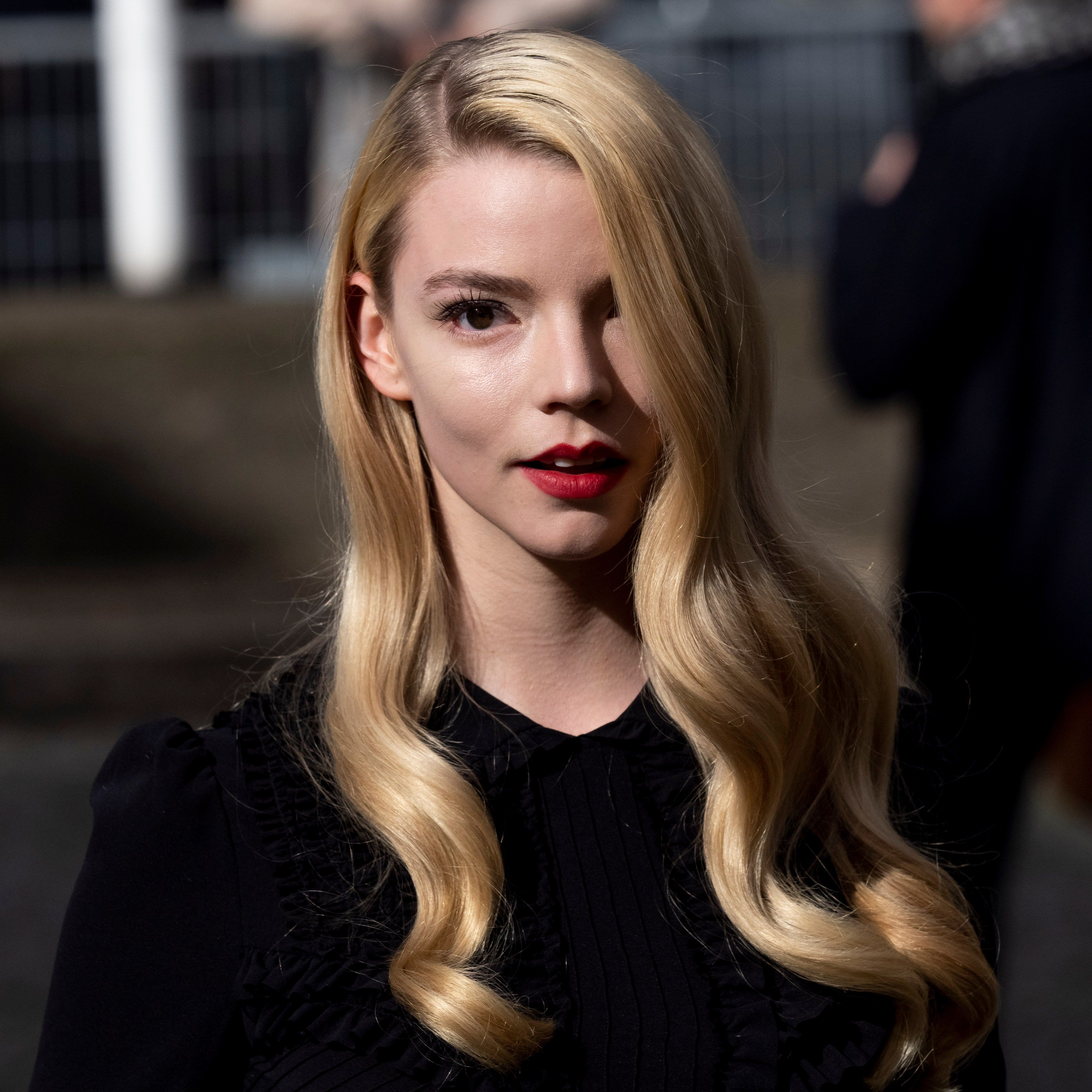 Anya Taylor-Joy with long blonde hair and red lipstick - Anya Taylor-Joy