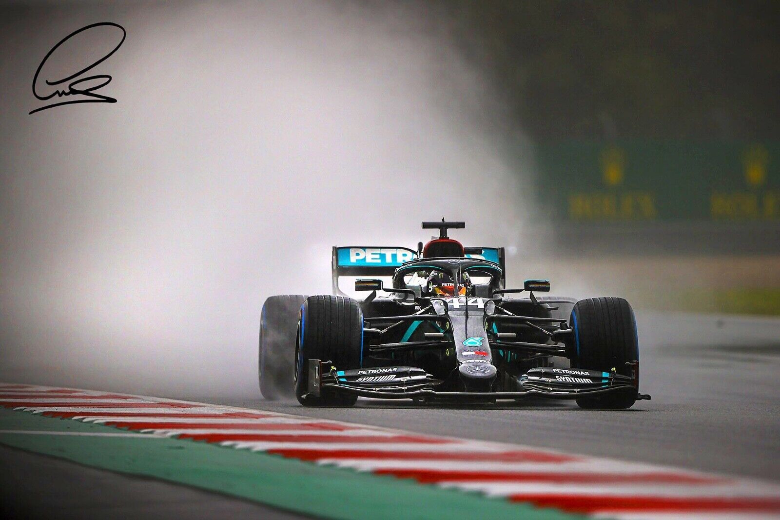 Lewis Hamilton in his Mercedes on a wet track - Lewis Hamilton