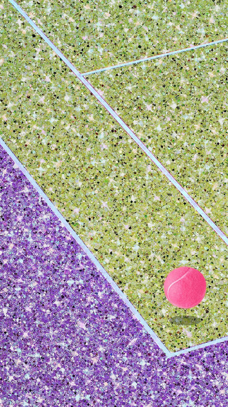 A pink tennis ball on a green and purple tennis court - Tennis