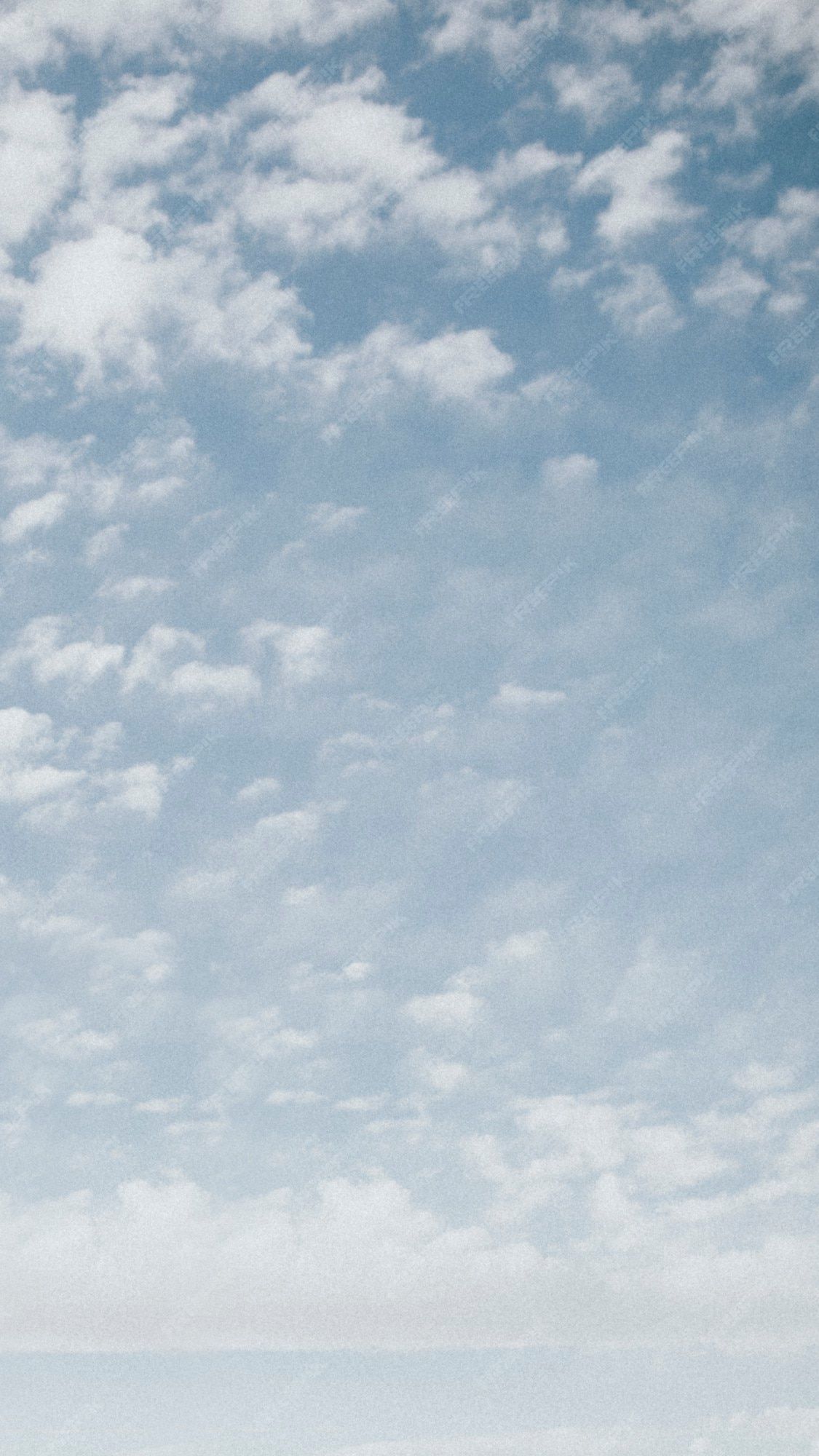 Premium Photo. Clouds scattered across the summer sky mobile wallpaper