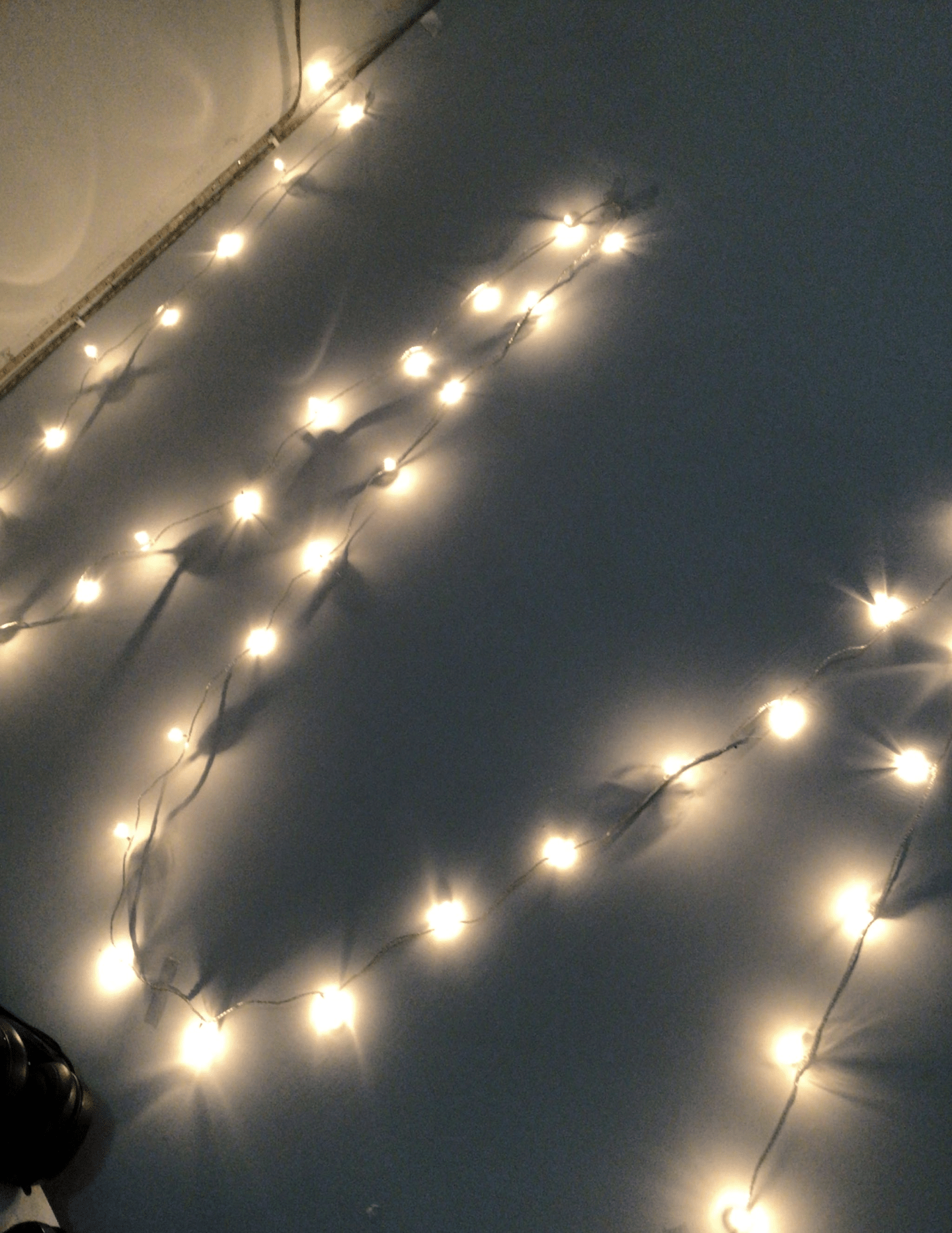 String lights on a wall - Fairy lights