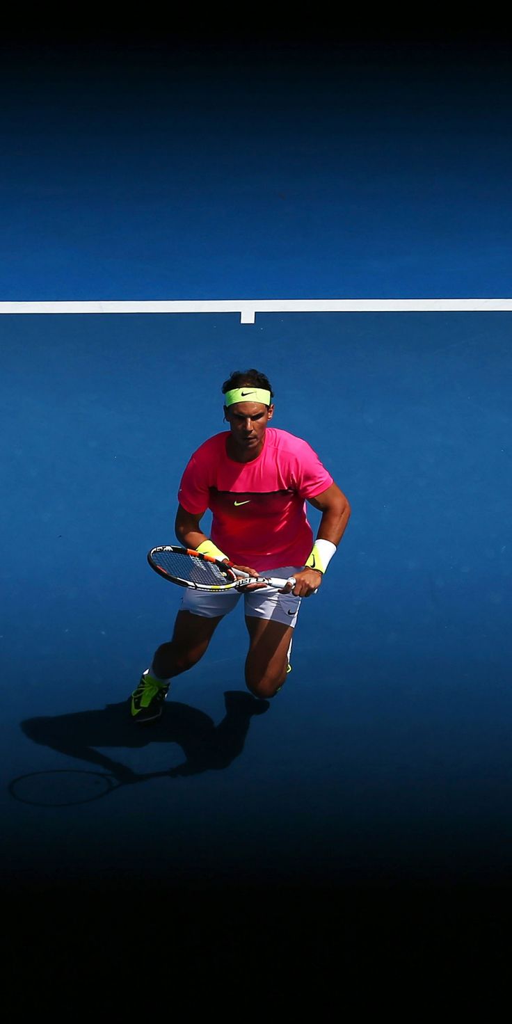 A man playing tennis on the court - Tennis