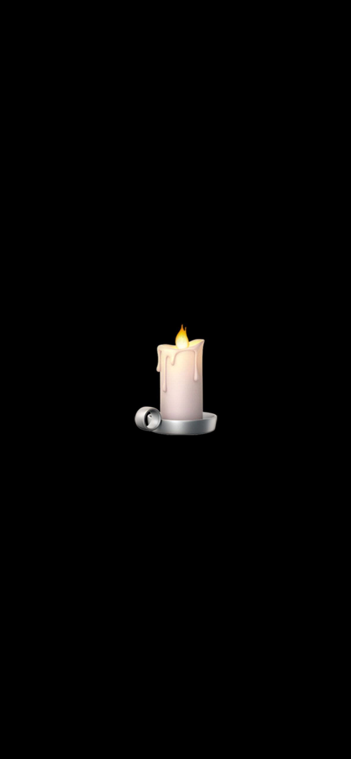 A candle burns on a black background. - Ghost