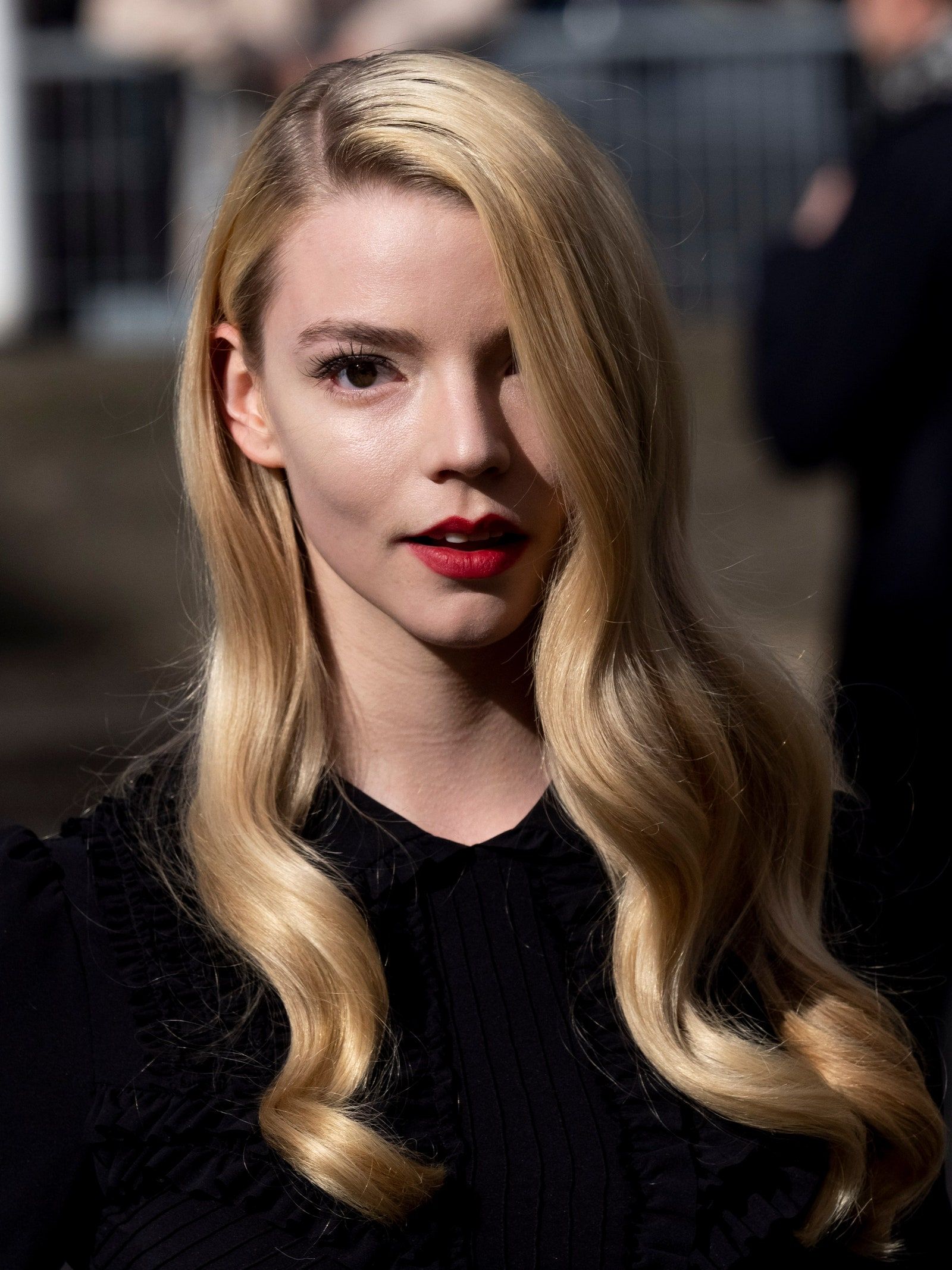 Anya Taylor-Joy wears a black top and red lipstick - Anya Taylor-Joy