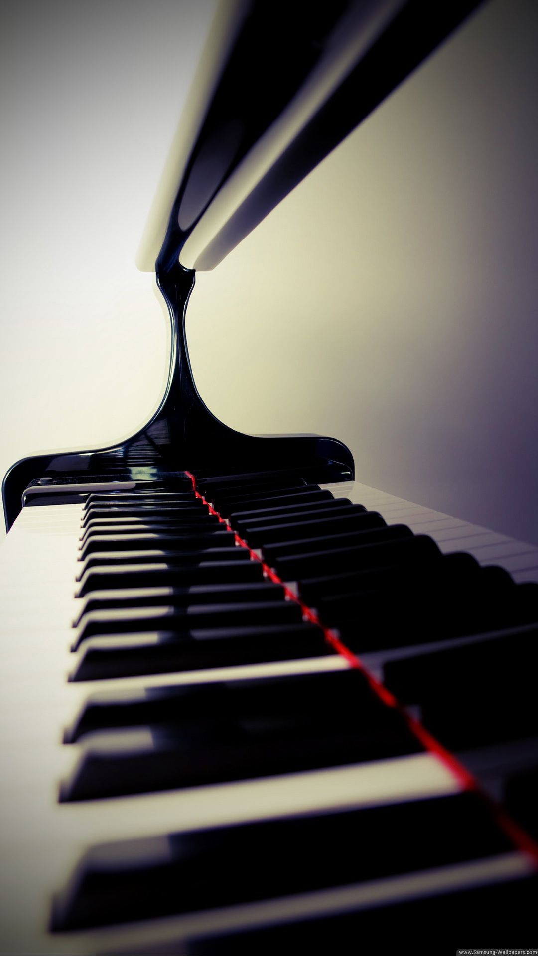 A close up of a piano keyboard - Piano