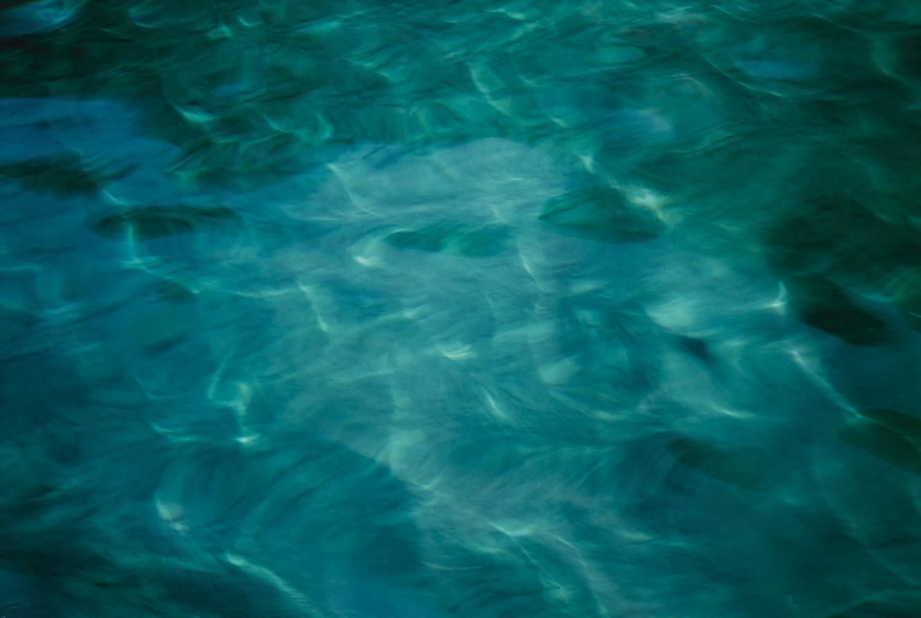 An abstract image of water, blurred to represent the flow of time - Aqua