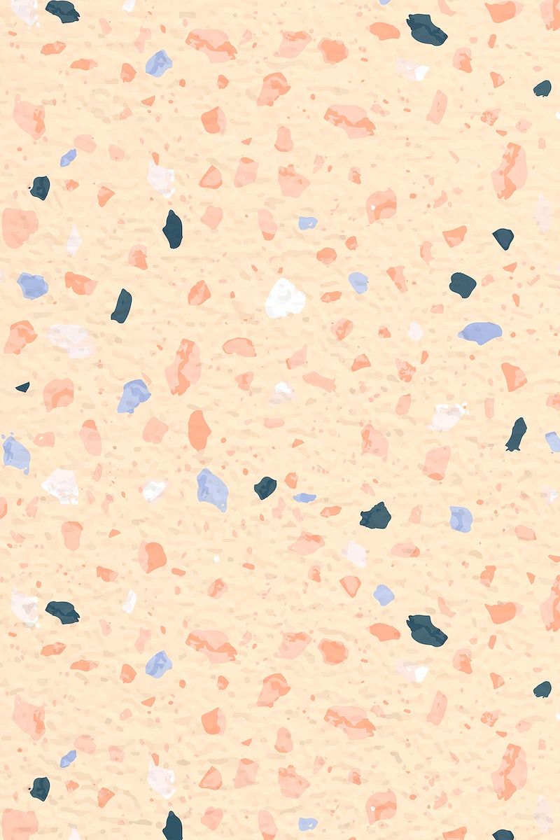 A pattern of orange, blue and pink dots on a yellow background - Terrazzo