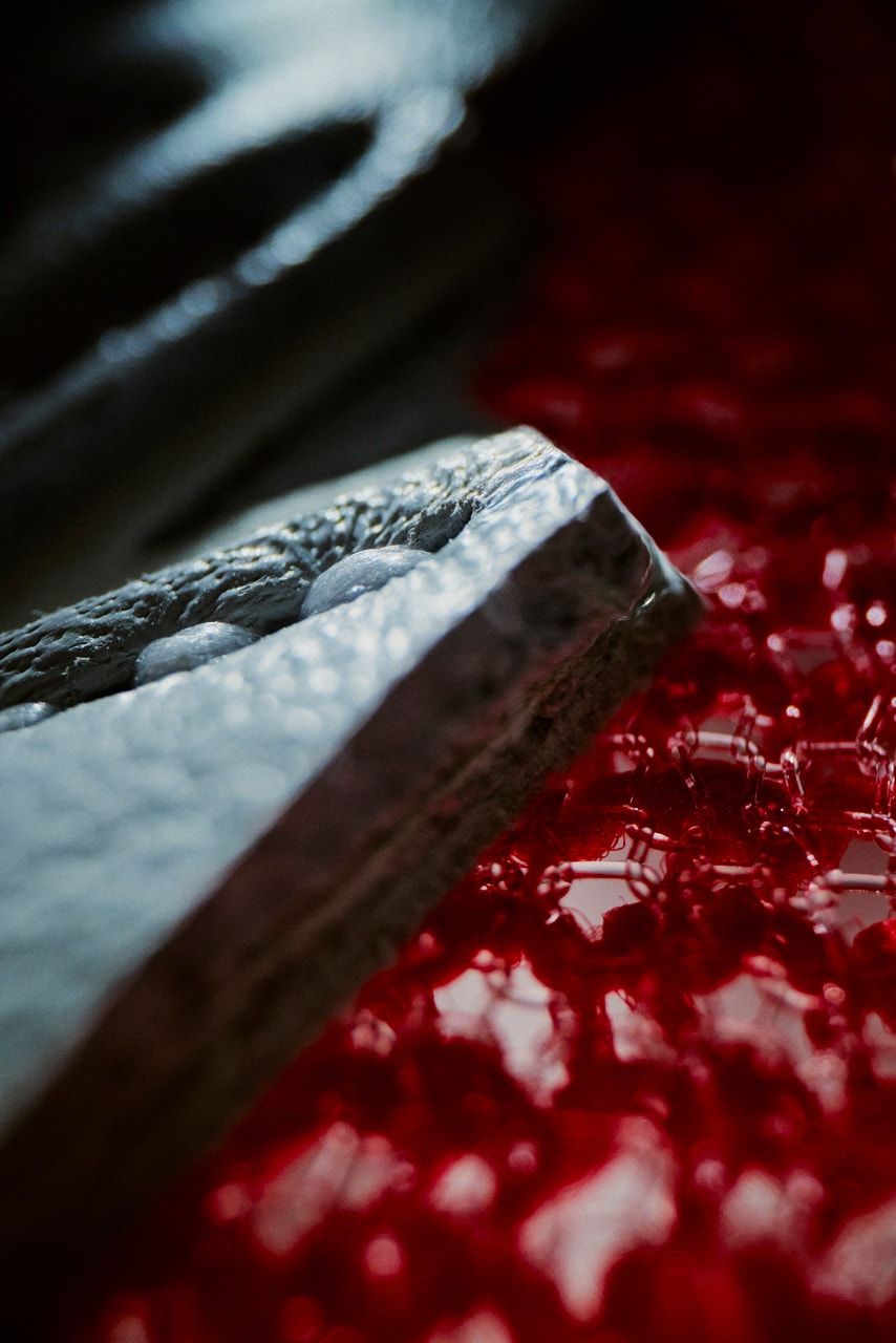 A knife on a red surface - New Balance