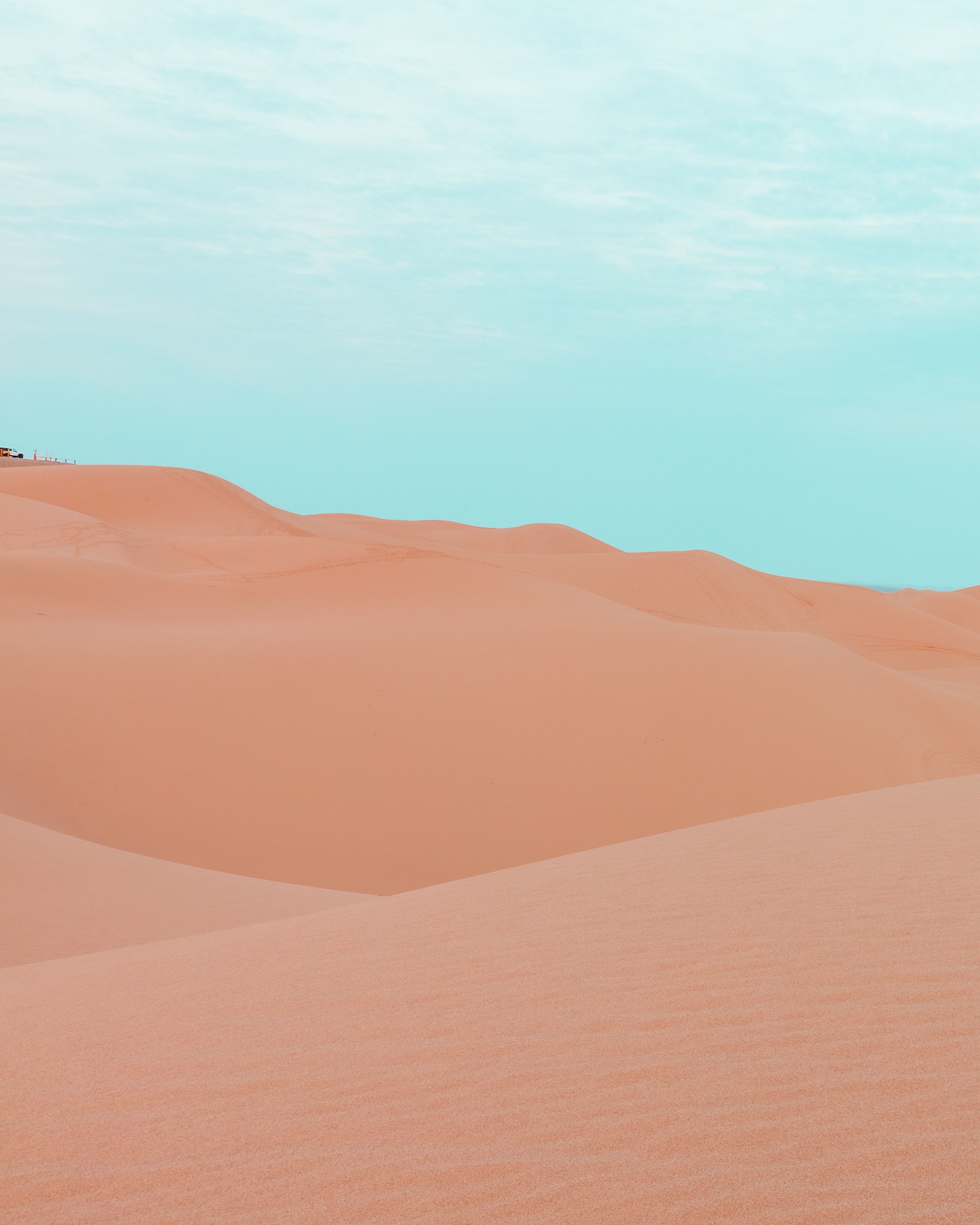 A man is riding his horse through the desert - Desert